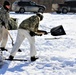 Cold-Weather Operations Course students practice building Arctic tent