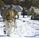 Cold-Weather Operations Course students practice building Arctic tent