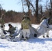 Cold-Weather Operations Course students practice building Arctic tent