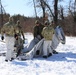 Cold-Weather Operations Course students practice building Arctic tent