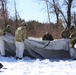 Cold-Weather Operations Course students practice building Arctic tent