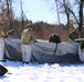 Cold-Weather Operations Course students practice building Arctic tent