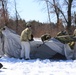 Cold-Weather Operations Course students practice building Arctic tent