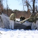 Cold-Weather Operations Course students practice building Arctic tent