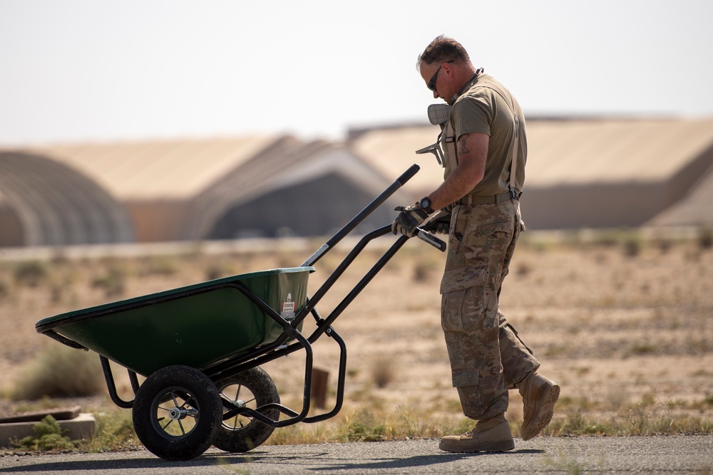 386th ECES “Dirt Boyz” provide routine maintenance and repairs to the flightline