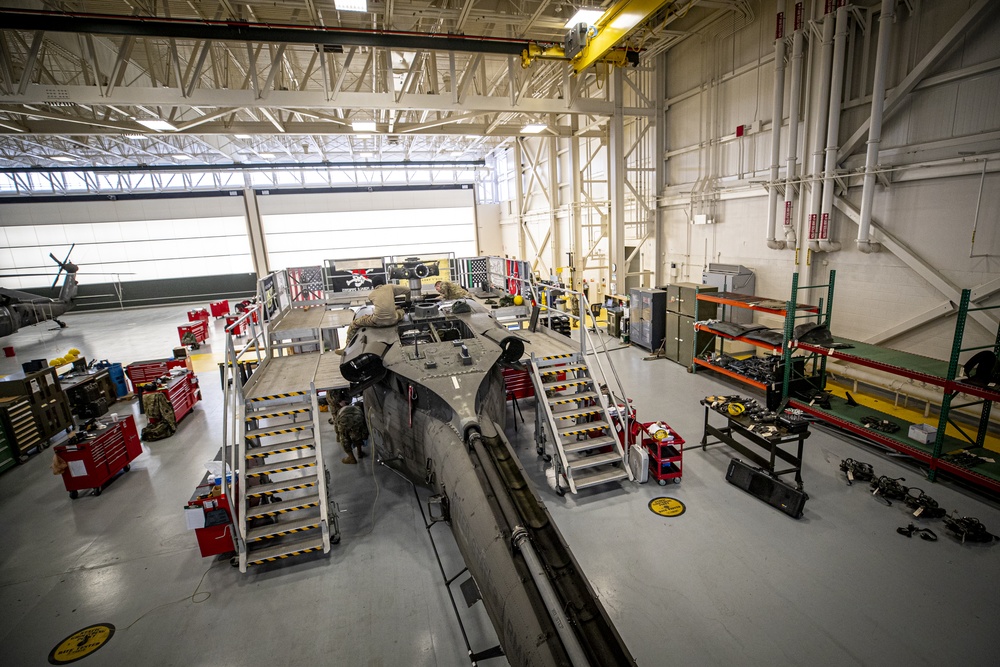 Phase maintenance being done on a Black Hawk Helicopter. 