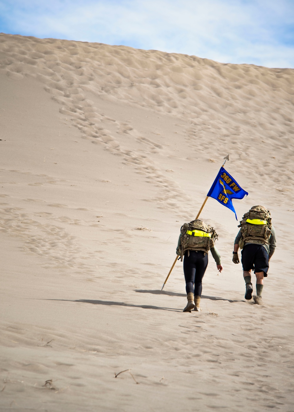 Airmen ruck 26 miles in sand dunes to tribute the Bataan Death March