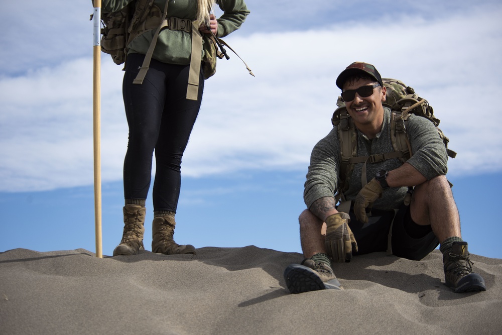 Airmen ruck 26 miles in sand dunes to tribute the Bataan Death March