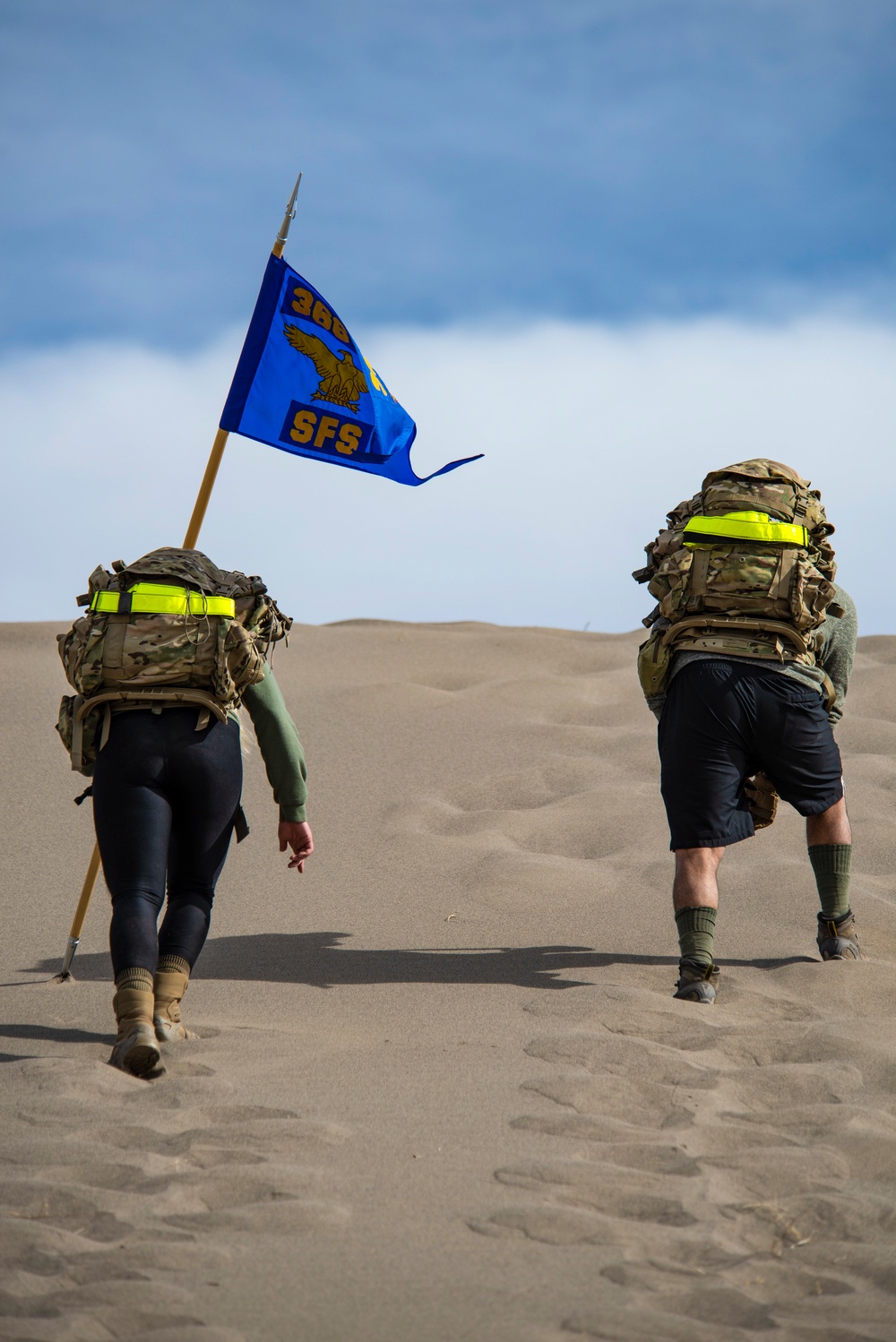 Airmen ruck 26 miles in sand dunes to tribute the Bataan Death March