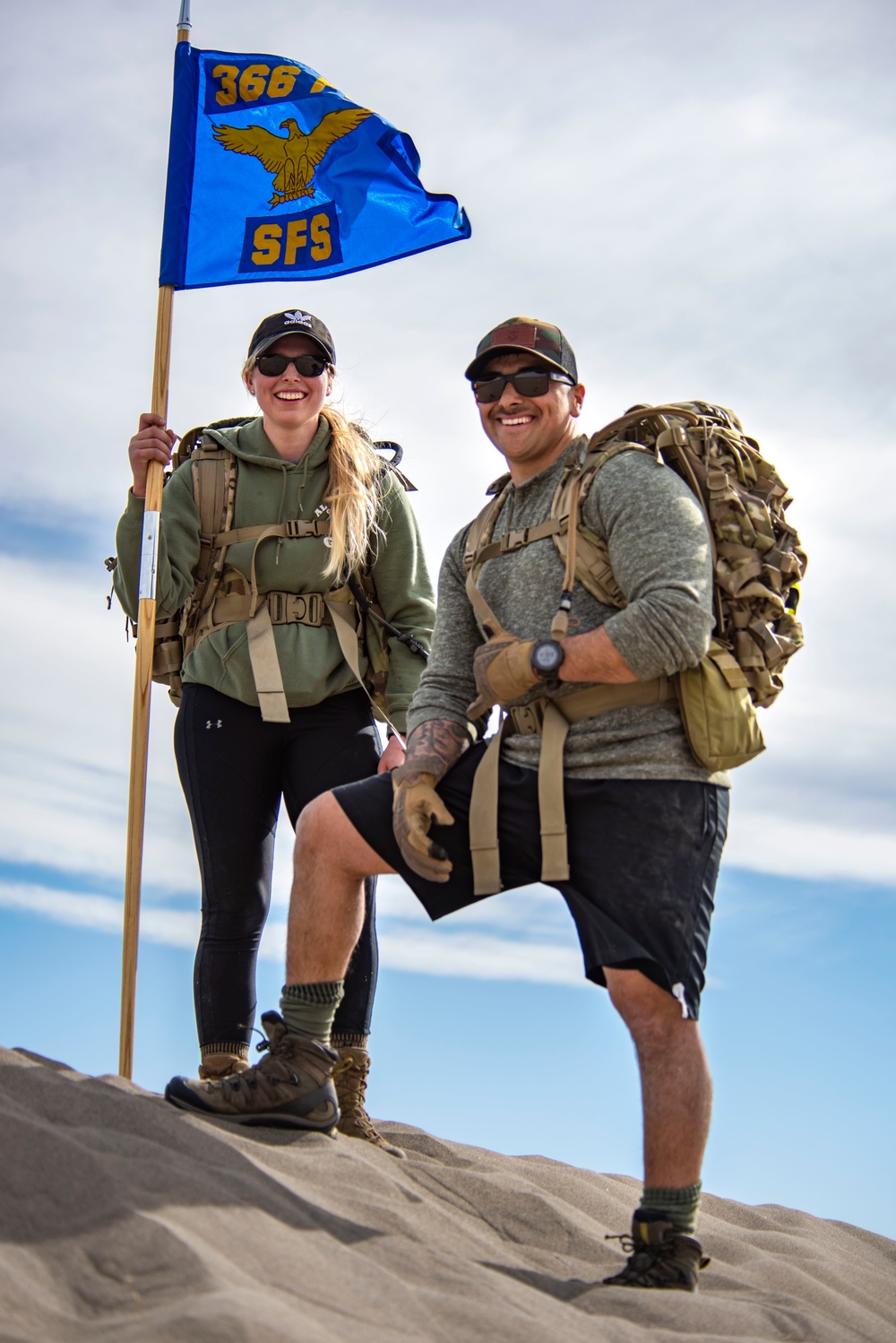 Airmen ruck 26 miles in sand dunes to tribute the Bataan Death March