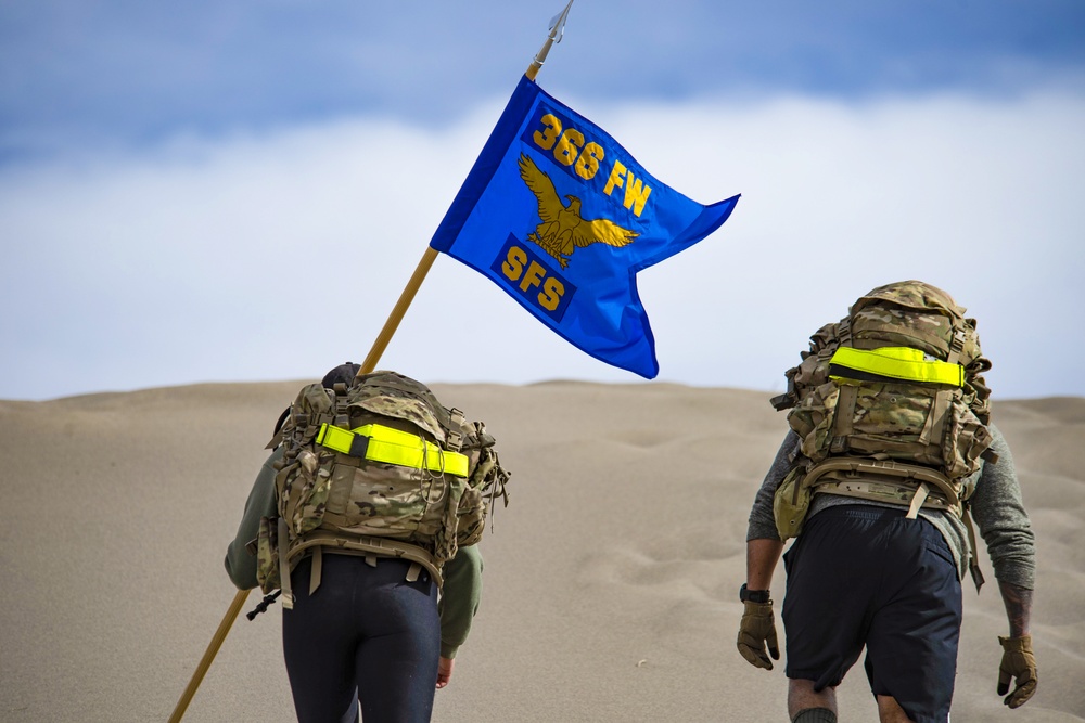 Airmen ruck 26 miles in sand dunes to tribute the Bataan Death March