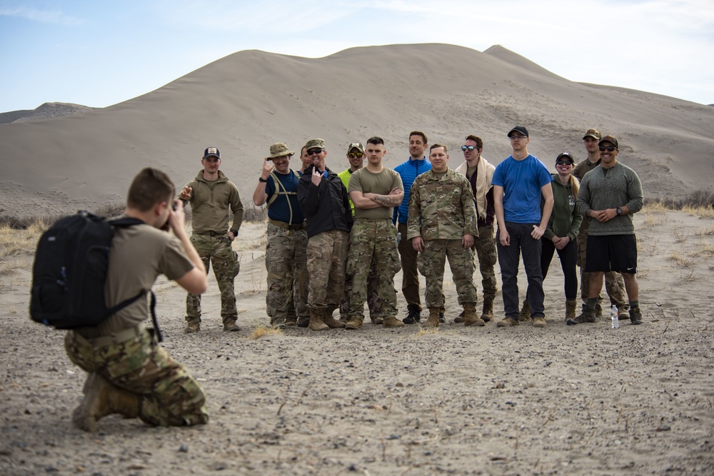 Airmen ruck 26 miles in sand dunes to tribute the Bataan Death March