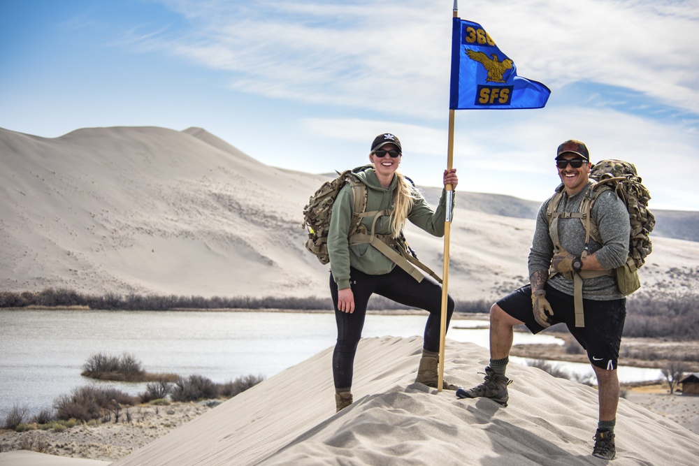 Airmen ruck 26 miles in sand dunes to tribute the Bataan Death March