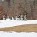 Fort McCoy Cold-Weather Operations Course students practice snowshoeing, ahkio sled use