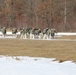 Fort McCoy Cold-Weather Operations Course students practice snowshoeing, ahkio sled use