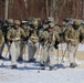 Fort McCoy Cold-Weather Operations Course students practice snowshoeing, ahkio sled use