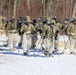 Fort McCoy Cold-Weather Operations Course students practice snowshoeing, ahkio sled use