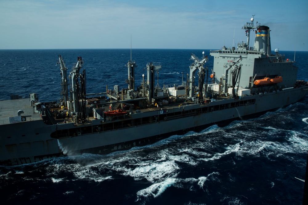 31st MEU Marines, USS America Sailors conduct replenishment at sea