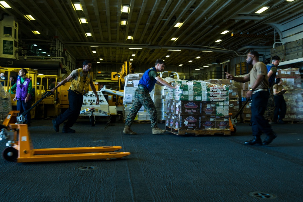 31st MEU Marines, USS America Sailors conduct replenishment at sea