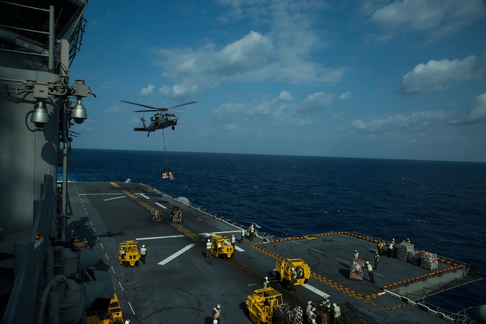 31st MEU Marines, USS America Sailors conduct replenishment at sea