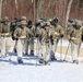 Fort McCoy Cold-Weather Operations Course students practice snowshoeing, ahkio sled use