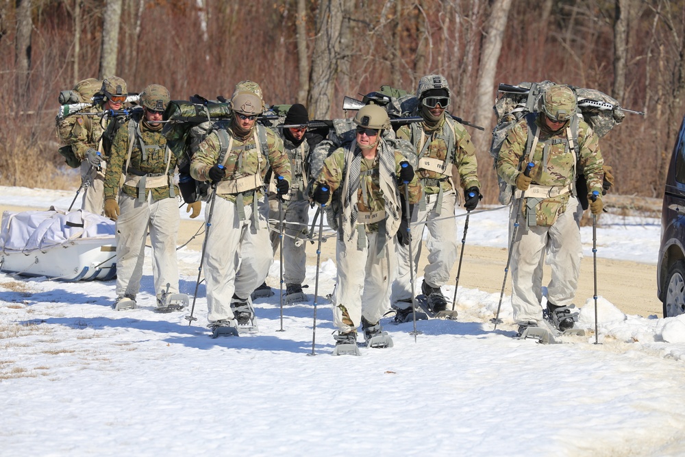 Fort McCoy Cold-Weather Operations Course students practice snowshoeing, ahkio sled use