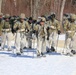 Fort McCoy Cold-Weather Operations Course students practice snowshoeing, ahkio sled use