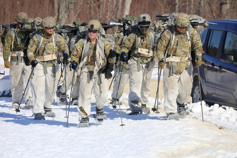 Fort McCoy Cold-Weather Operations Course students practice snowshoeing, ahkio sled use