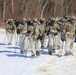 Fort McCoy Cold-Weather Operations Course students practice snowshoeing, ahkio sled use