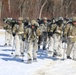 Fort McCoy Cold-Weather Operations Course students practice snowshoeing, ahkio sled use