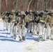 Fort McCoy Cold-Weather Operations Course students practice snowshoeing, ahkio sled use