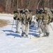 Fort McCoy Cold-Weather Operations Course students practice snowshoeing, ahkio sled use