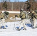 Fort McCoy Cold-Weather Operations Course students practice snowshoeing, ahkio sled use