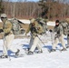 Fort McCoy Cold-Weather Operations Course students practice snowshoeing, ahkio sled use