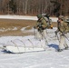 Fort McCoy Cold-Weather Operations Course students practice snowshoeing, ahkio sled use