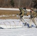 Fort McCoy Cold-Weather Operations Course students practice snowshoeing, ahkio sled use