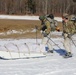 Fort McCoy Cold-Weather Operations Course students practice snowshoeing, ahkio sled use