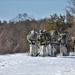 Fort McCoy Cold-Weather Operations Course students practice snowshoeing, ahkio sled use