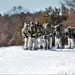 Fort McCoy Cold-Weather Operations Course students practice snowshoeing, ahkio sled use