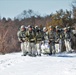 Fort McCoy Cold-Weather Operations Course students practice snowshoeing, ahkio sled use