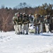 Fort McCoy Cold-Weather Operations Course students practice snowshoeing, ahkio sled use