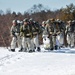 Fort McCoy Cold-Weather Operations Course students practice snowshoeing, ahkio sled use