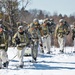 Fort McCoy Cold-Weather Operations Course students practice snowshoeing, ahkio sled use