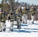 Fort McCoy Cold-Weather Operations Course students practice snowshoeing, ahkio sled use