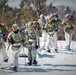 Fort McCoy Cold-Weather Operations Course students practice snowshoeing, ahkio sled use