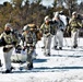 Fort McCoy Cold-Weather Operations Course students practice snowshoeing, ahkio sled use