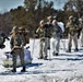 Fort McCoy Cold-Weather Operations Course students practice snowshoeing, ahkio sled use