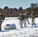 Fort McCoy Cold-Weather Operations Course students practice snowshoeing, ahkio sled use