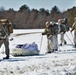 Fort McCoy Cold-Weather Operations Course students practice snowshoeing, ahkio sled use