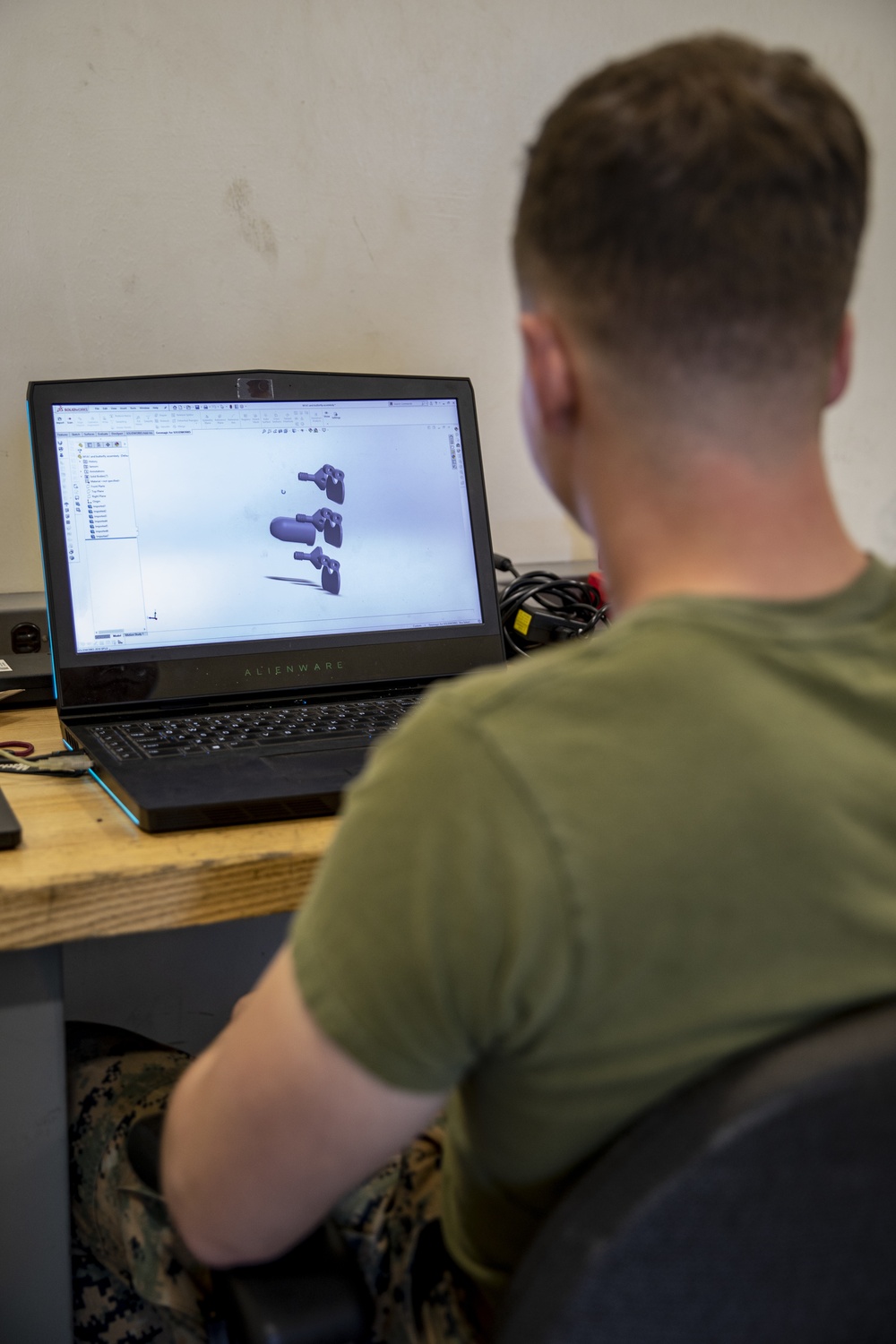Into the 3rd Dimension | 3rd MLG Marines create metal parts using a 3D printer